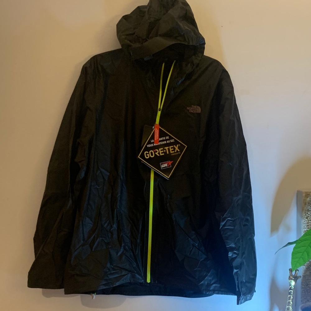 The North Face Men's Black Raincoat with Bright Yellow Zipper